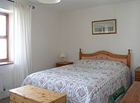 The king size double room at Bluebell Cottage