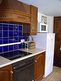 Cooking area with extractor at Bluebell Cottage